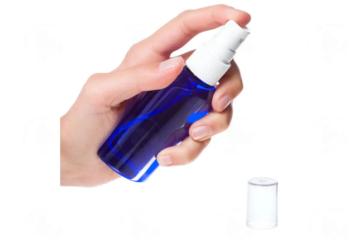 2 Oz. Oval Bottle: Blue Plastic With White Spray Top