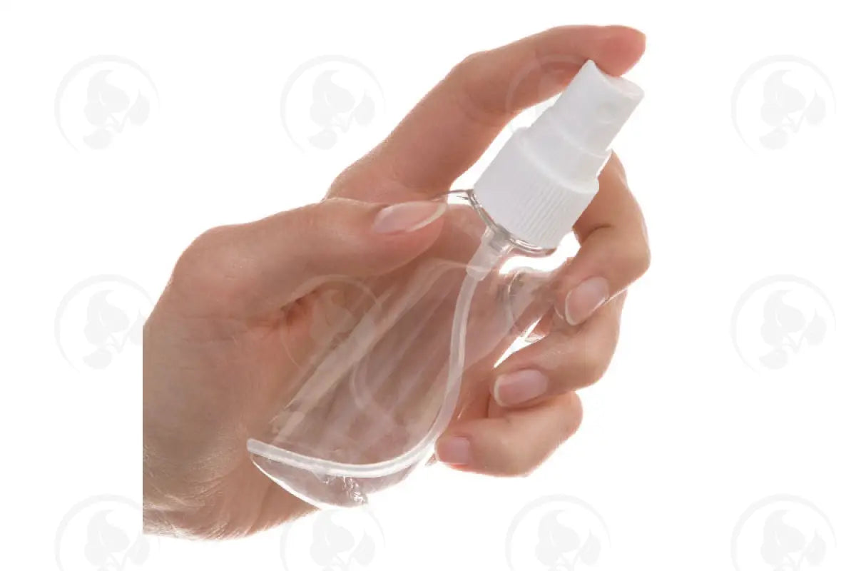 2 Oz. Oval Bottle: Clear Plastic With White Misting Spray Top
