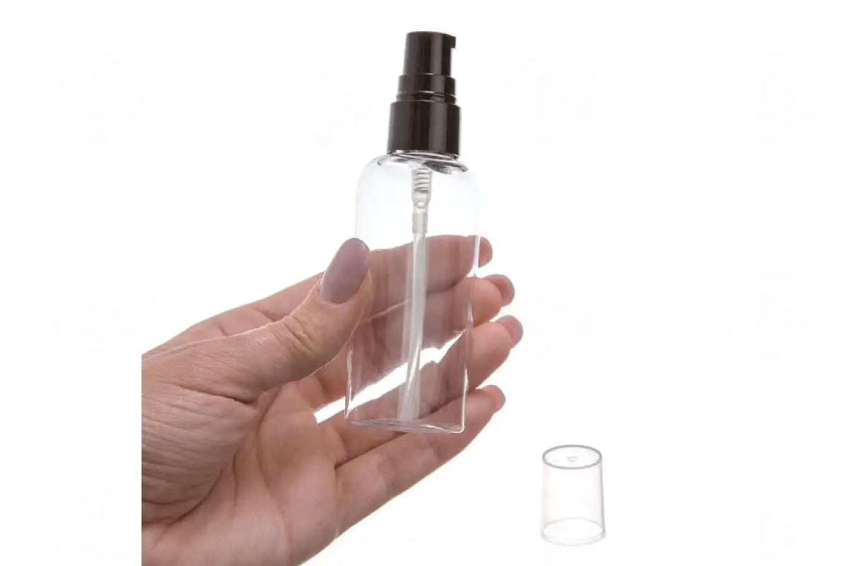 2 Oz. Oval Bottle: Clear Plastic With Black Treatment Pump