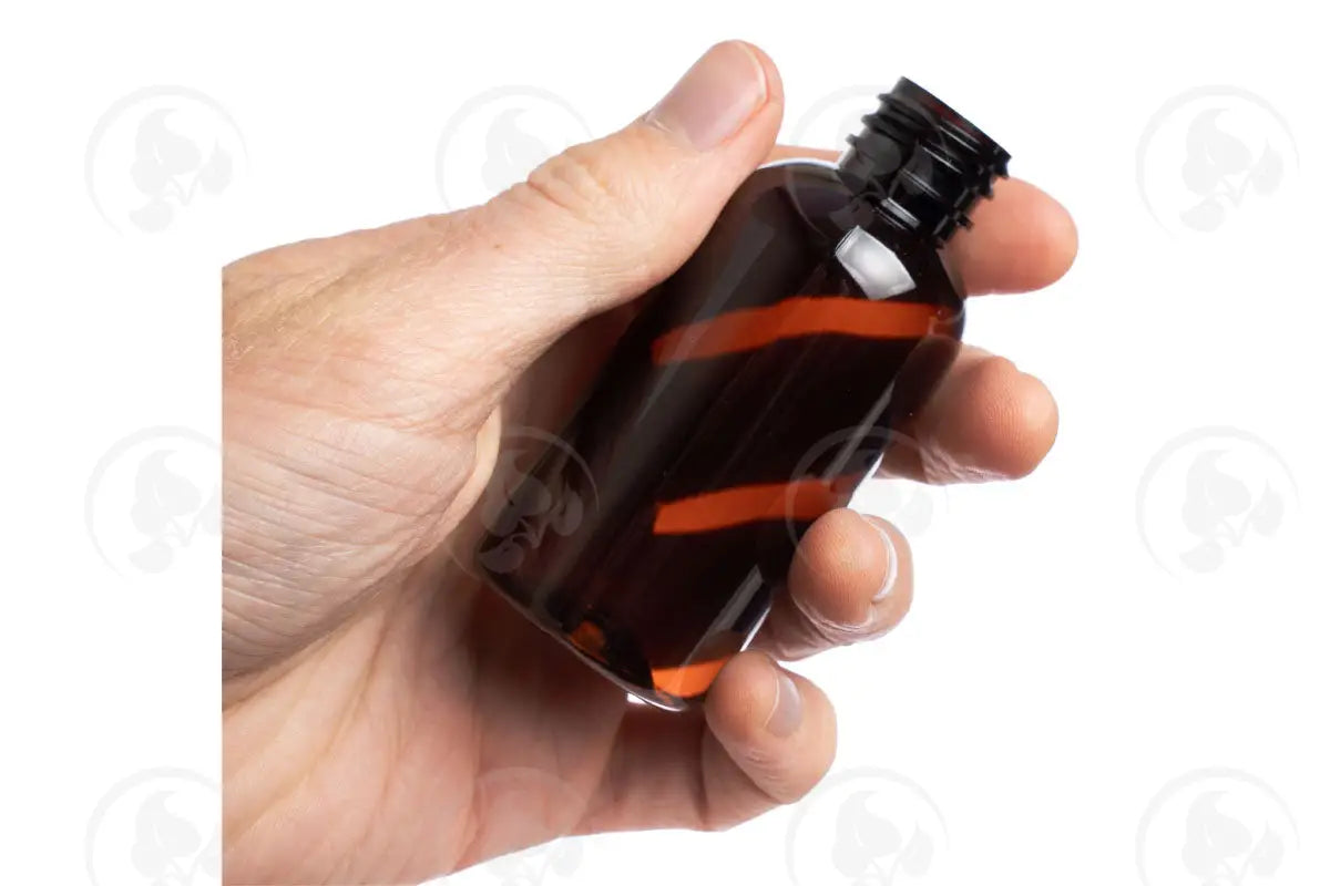 2 Oz. Boston Round Bottle: Amber Plastic 20-410 Neck Size