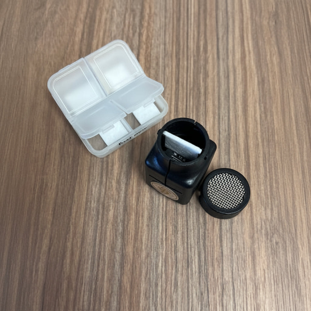 My Fuzie Personal Diffuser with a zippered carabiner case, 5 pads, and 1 pad storage case.
